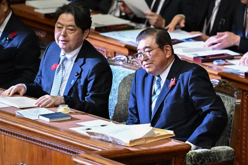 林官房長官「承認の適切な時期を含め検討中」、政府は慎重対応