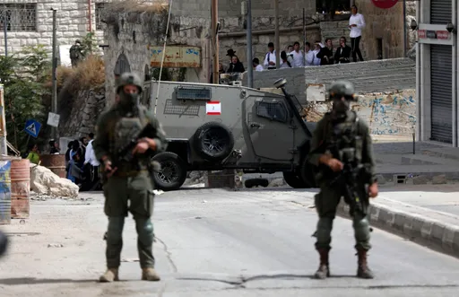 Illegal Israeli settlers hoist US flag amid attacks on Palestinians in occupied West Bank