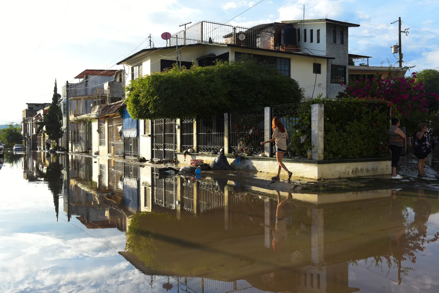 Rainstorms ravage Mexico as landslides kill 27 and rivers overflow