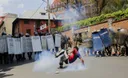 Madagascar soldiers escort protesters in capital