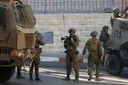 No cheers, no filming: Israeli forces raid homes, threaten families of Palestinian prisoners