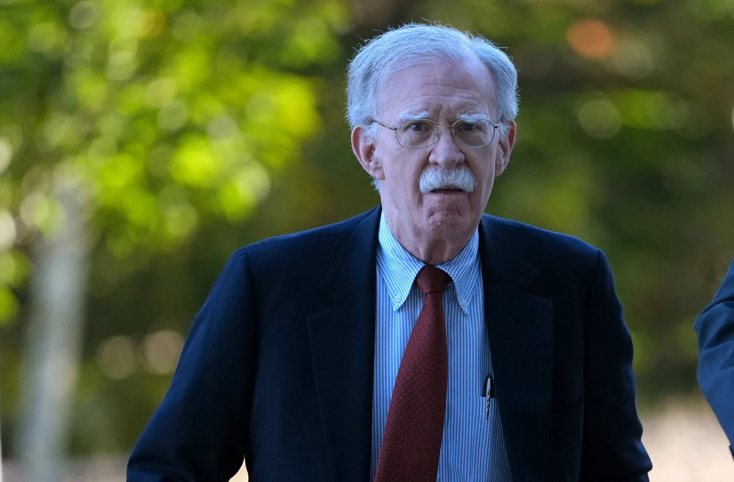 John Bolton, ex-Trump advisor, surrenders following charges of mishandling classified information
