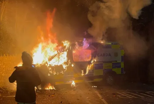 Six arrested after 'violent' anti-asylum protest outside Dublin hotel