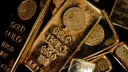 Gold prices fall nearly 8% from a record high on Monday
