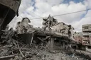 Israeli forces say ceasefire back on after killing over 90 Palestinians in Gaza strikes