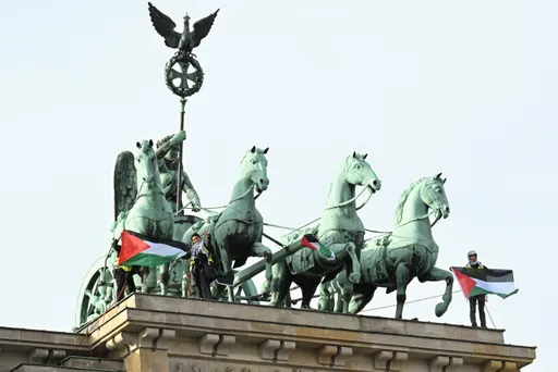 Activists climb Brandenburg Gate to denounce Germany's Gaza policy