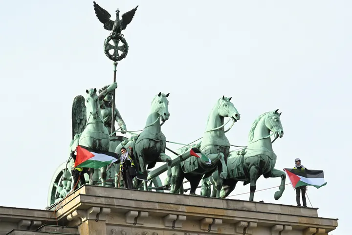 Activists climb Brandenburg Gate to denounce Germany's Gaza policy