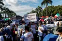Filipinos flood streets demanding transparency after deadly typhoons