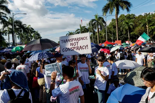 Filipinos flood streets demanding transparency after deadly typhoons