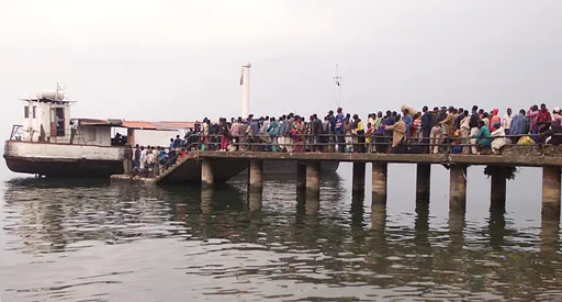 Rescuers search for 70 missing after boat capsizes in DR Congo