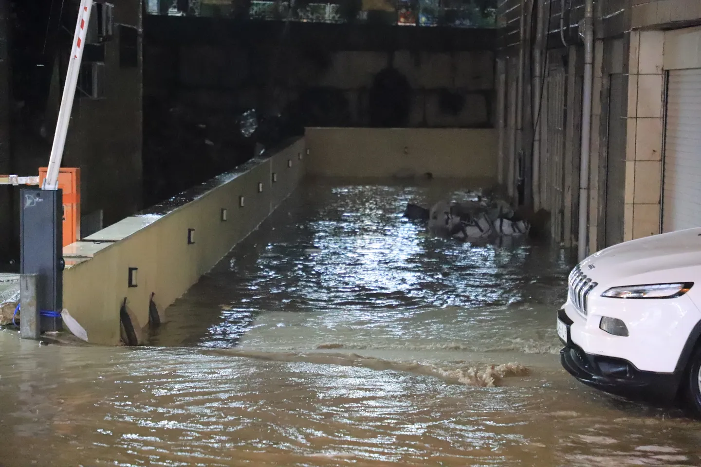 Heavy rains shatter section of Israel’s separation wall in occupied West Bank