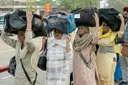 Indian Sikh pilgrims cross into Pakistan in first major border opening since May clashes