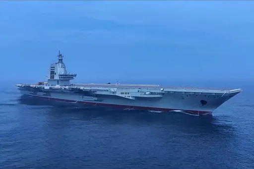 China's new aircraft carrier enters service in major naval power boost