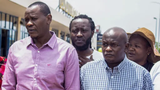 Kenyan activists arrive home after their release from custody in Uganda