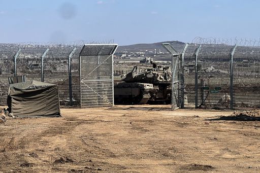 An Israeli tank parked by the fence of the ceasefire line by Syria and the Israeli-occupied Golan Heights, near Quneitra crossing, on March 2, 2025.