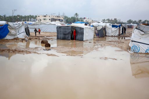 Heavy rains flood thousands of tents sheltering displaced civilians in Gaza.