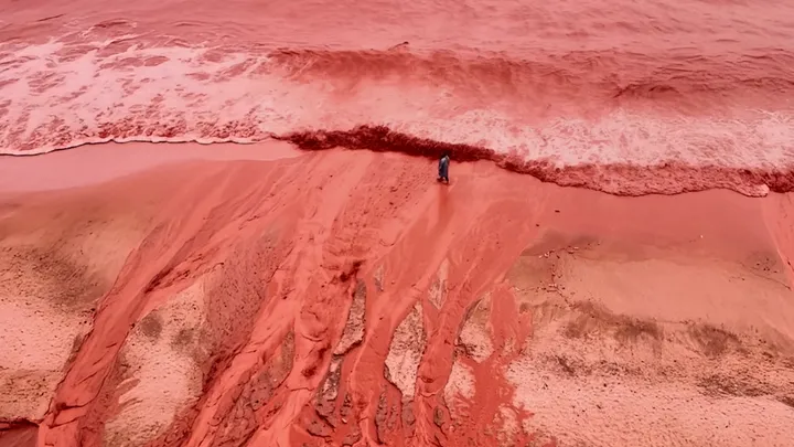 Rain turns Iran's Hormuz Island crimson for the first time this year