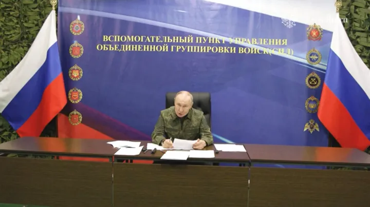 Putin visits battle zone in Ukraine after Russia claims capturing two cities