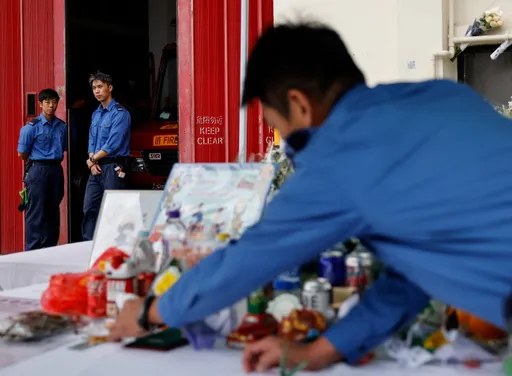 Hong Kong judge to lead independent inquiry into fire that killed 151