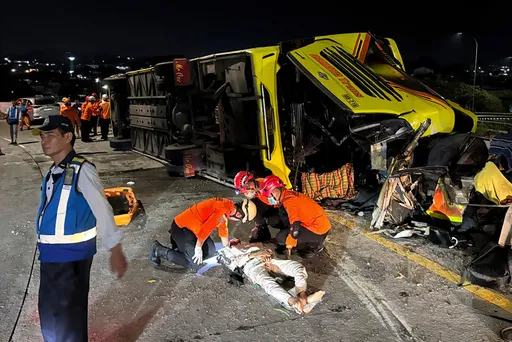 Passenger bus crash in Indonesia kills at least 16 people, a rescue worker says