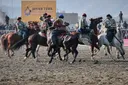 Thousands cheer on Afghanistan's traditional buzkashi equestrian games in Kabul
