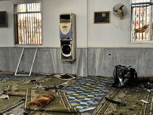 Hundreds mourn in Syria's Homs after deadly mosque bombing