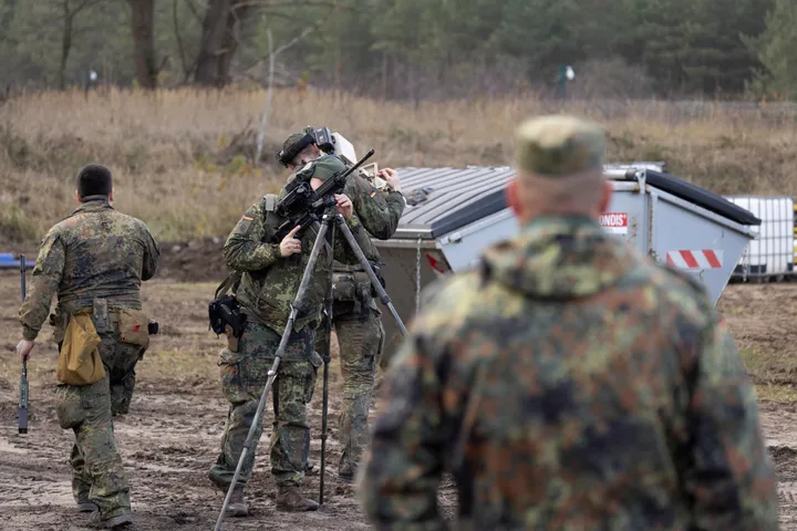 Debate grows after Germany requires approval for young men’s extended foreign stays