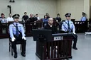 China executes former senior banker for taking $156M bribes
