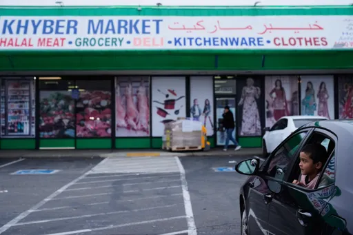 Spike in ICE arrests leaves Afghan community in fear after National Guard attack