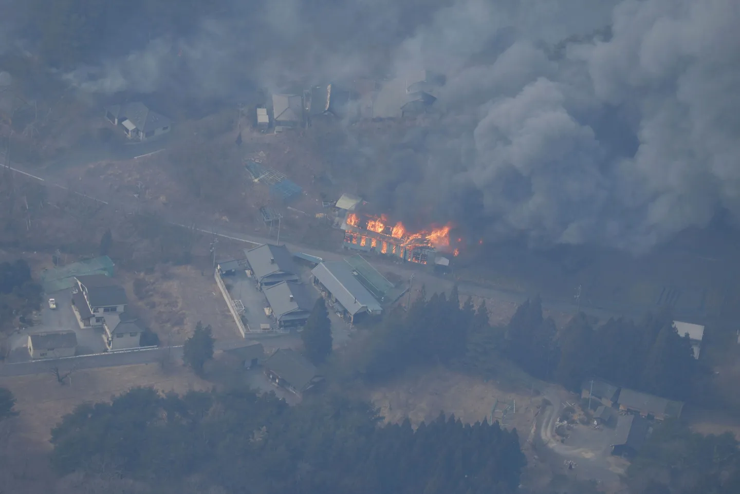 Japan sends 1,700 firefighters to battle raging forest fire