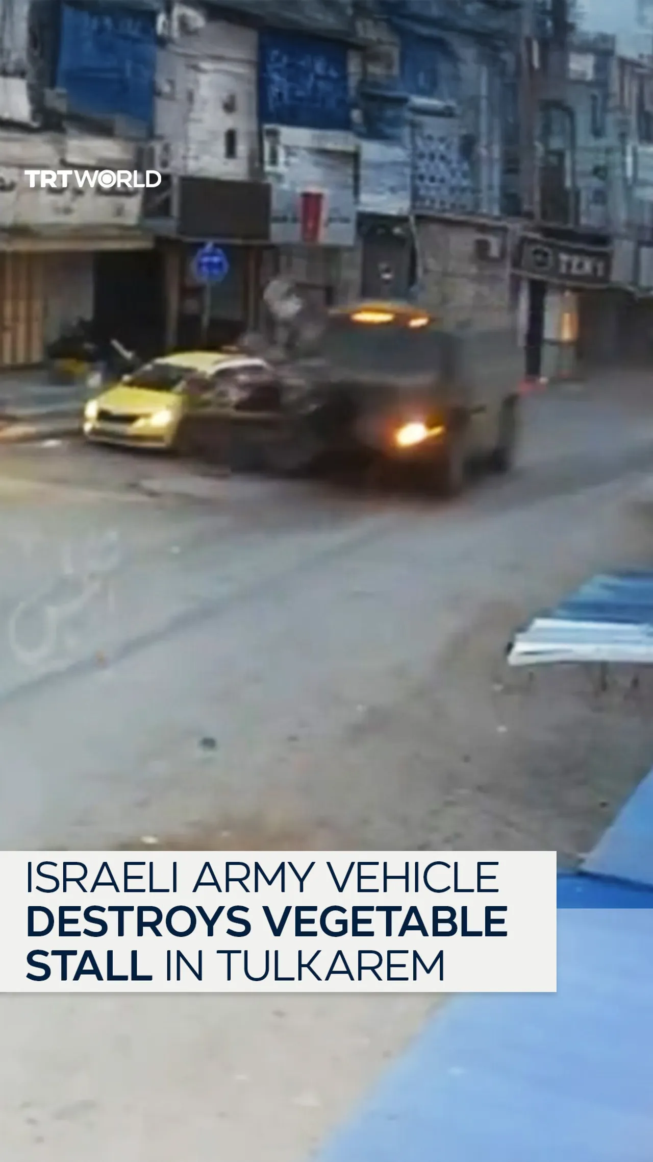 Israeli armoured vehicle deliberately drives into Palestinian vegetable stall