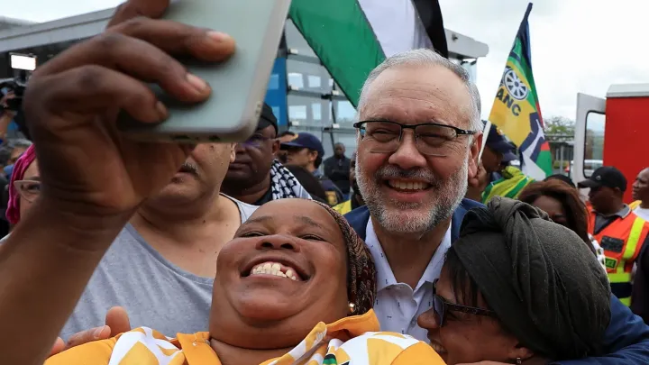 SA ambassador expelled from US arrives home to rousing cheers