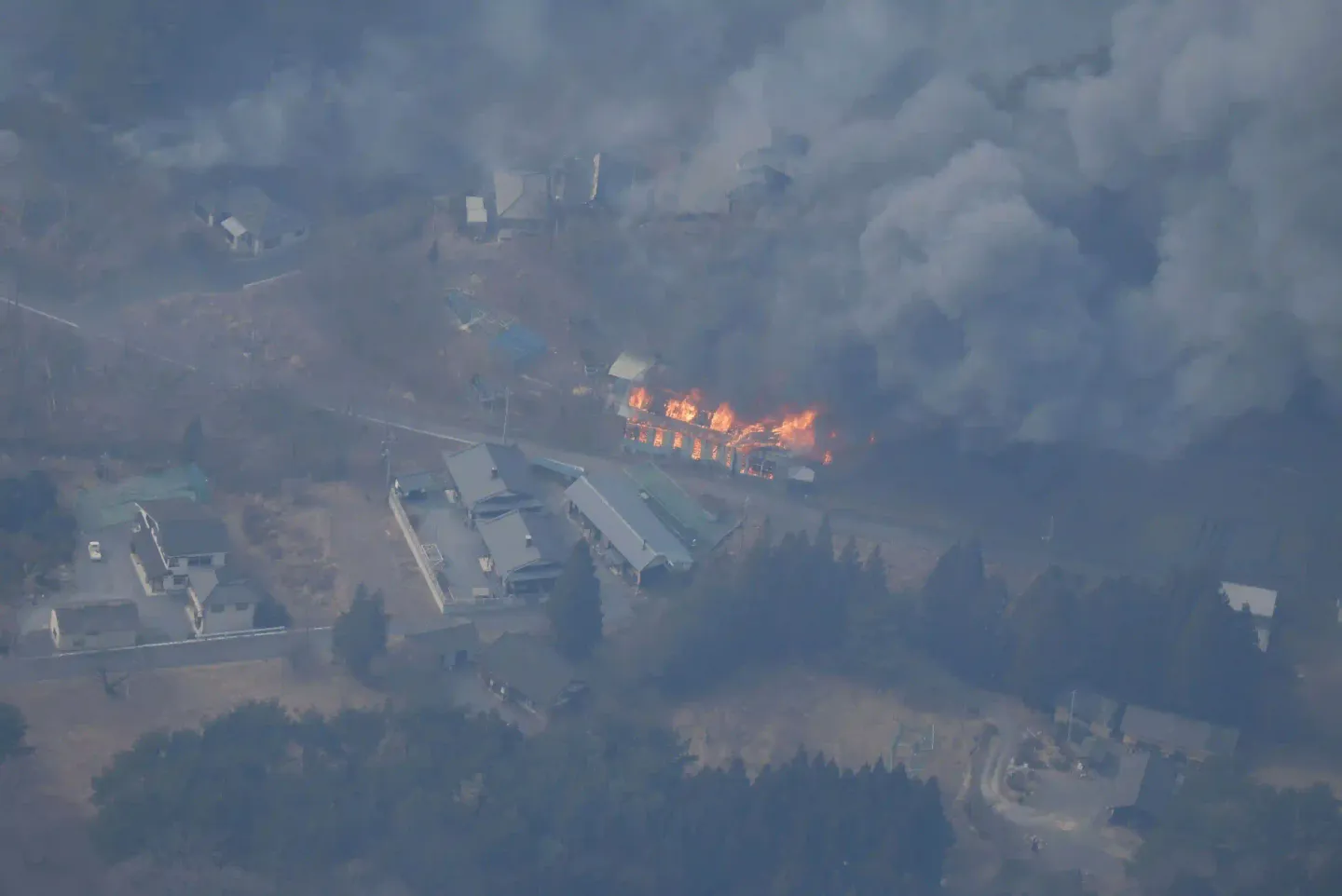 Japan sends 1,700 firefighters to battle raging forest fire