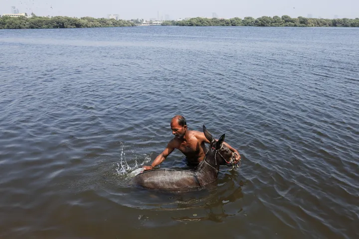 Pakistan braces for more extreme weather after unexpected hailstorm, ongoing heatwave