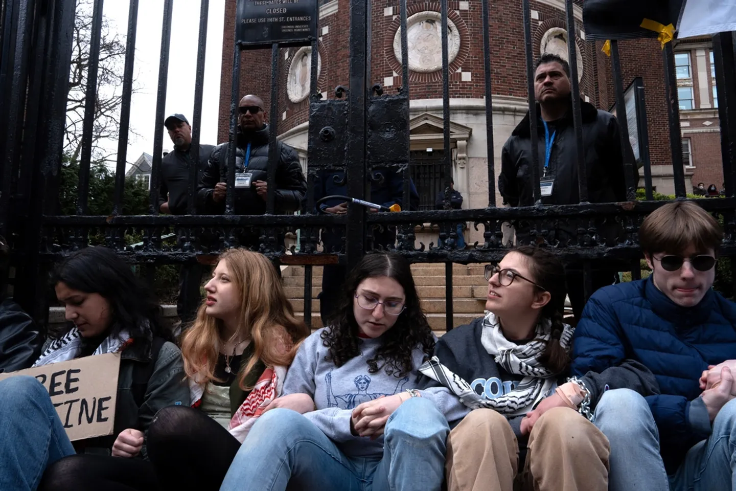 Students chain themselves to Columbia University's gate to demand release of Khalil