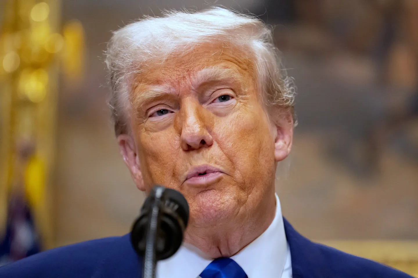 Trump defends resettling white South Africans as refugees in US