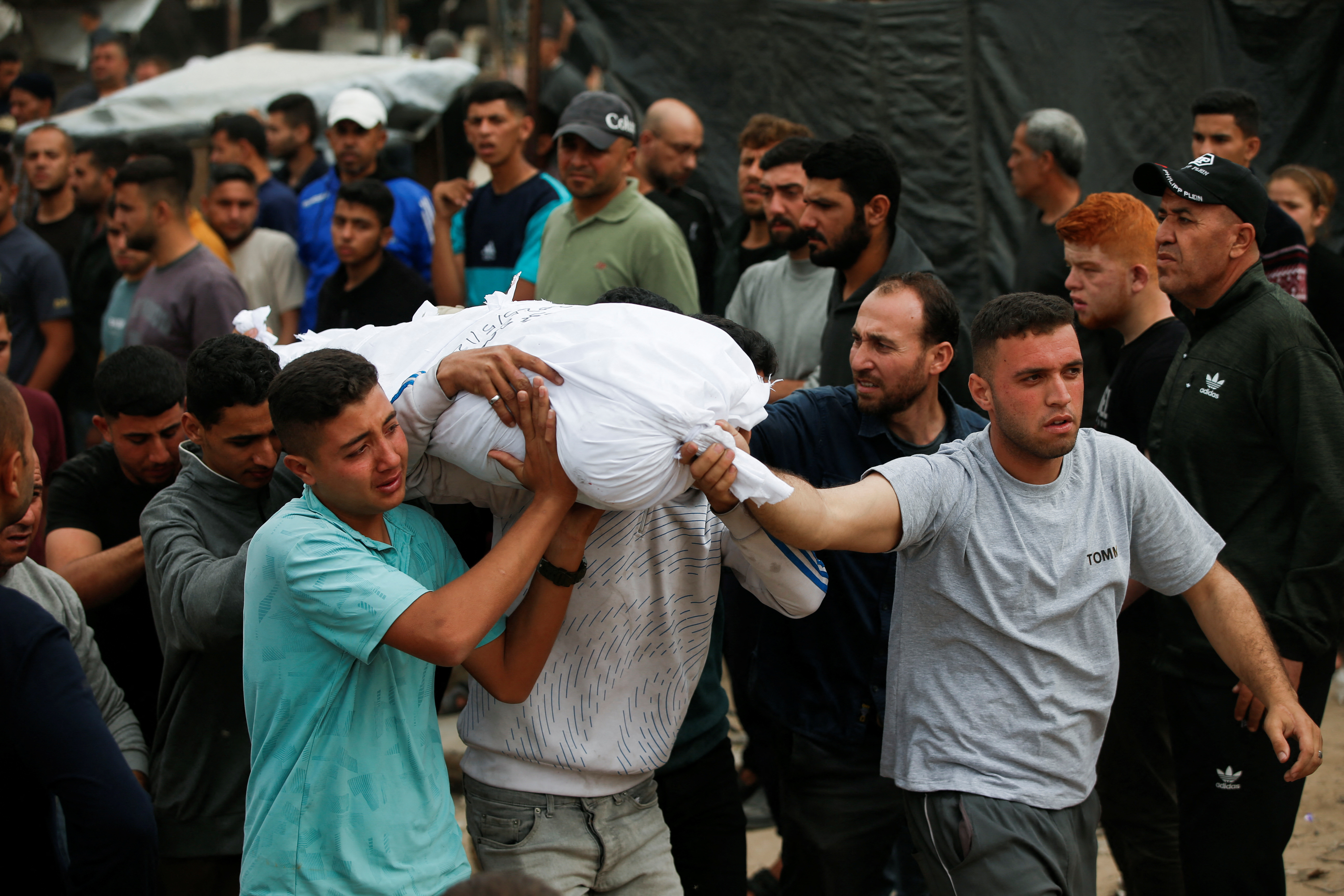 Deadly Israeli strikes continue to pound Gaza, killing hundreds