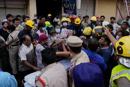 Children among dead after massive fire engulfs building in India