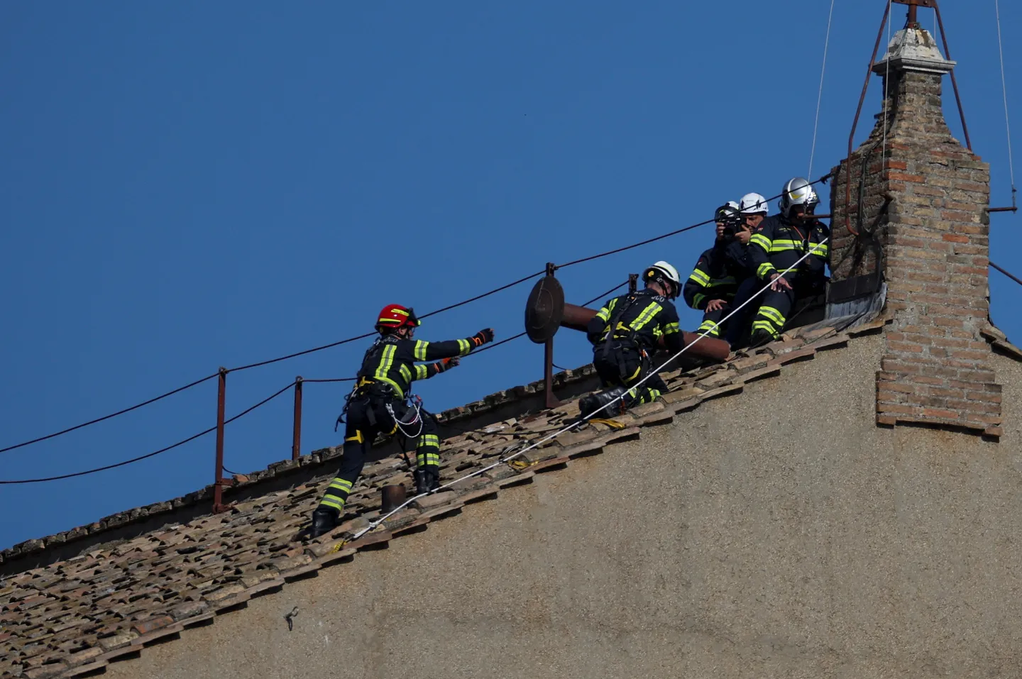 Vatican prepares for conclave with smoke chimney installation