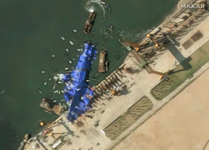 North Korea says it has raised a capsized destroyer upright as it continues repair