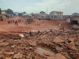 Nearly 100 missing a week after floods tore through Nigerian town
