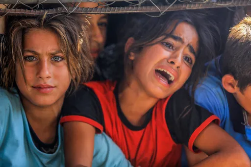 In pictures: Starving Palestinians seek food at new distribution sites