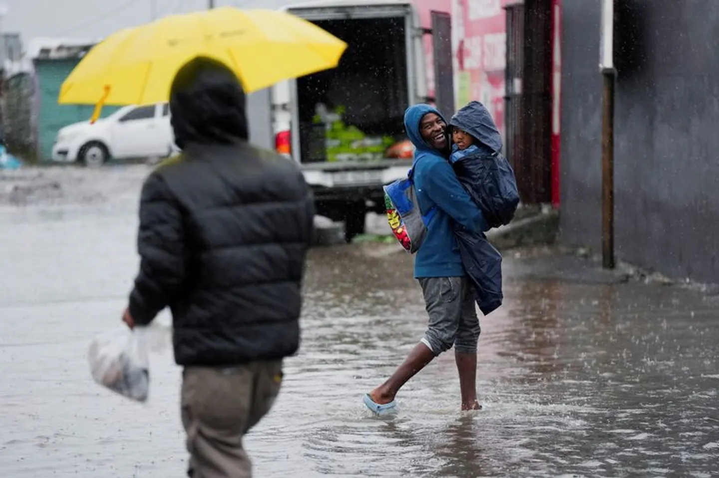 Rescuers race to save South Africa flood survivors