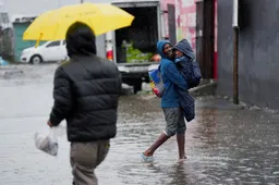 Rescuers race to save South Africa flood survivors