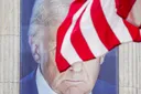 Trump signs order to ban flag burning despite Supreme Court ruling it's protected speech
