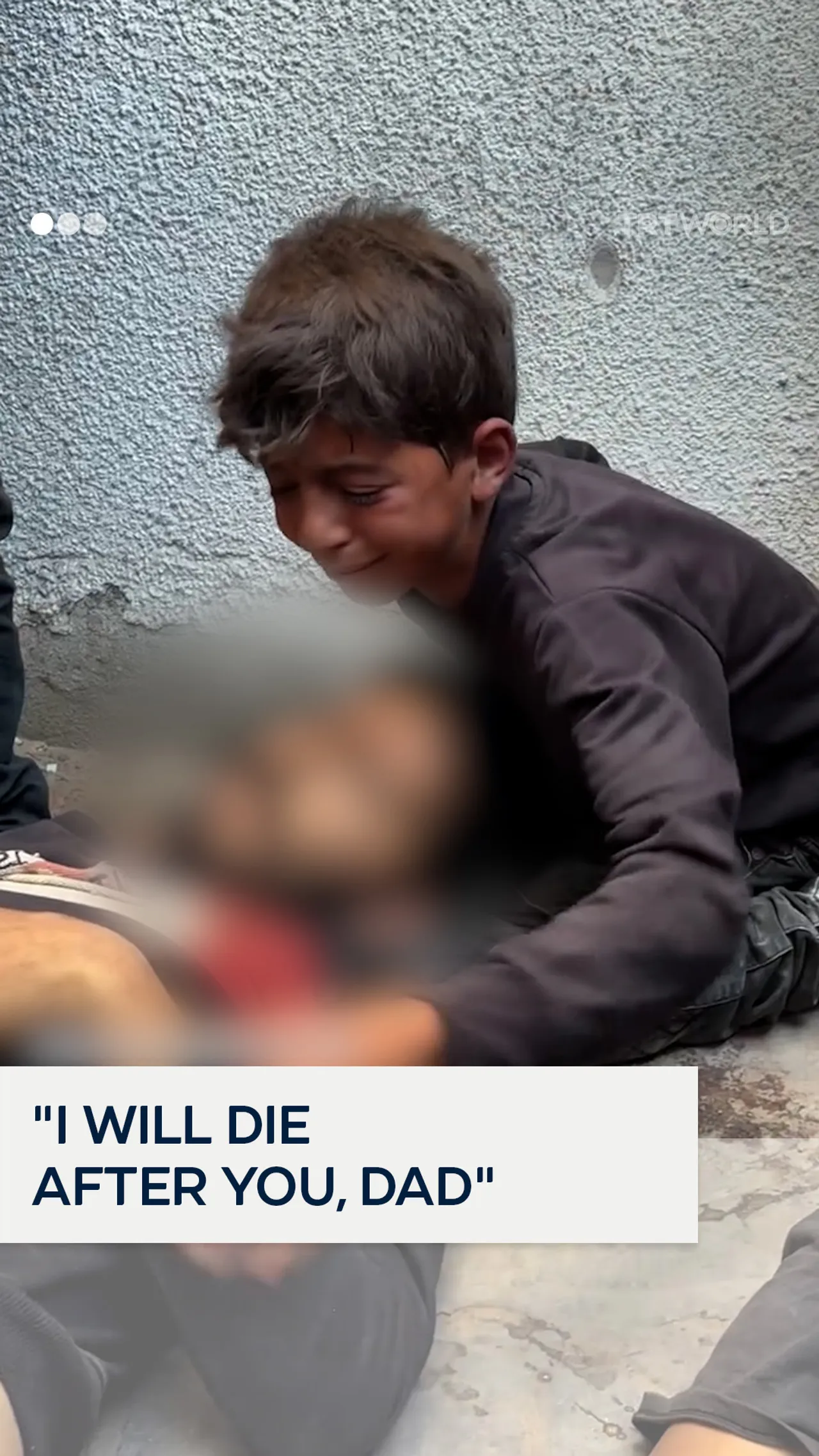 Palestinian child bids tearful farewell to his father