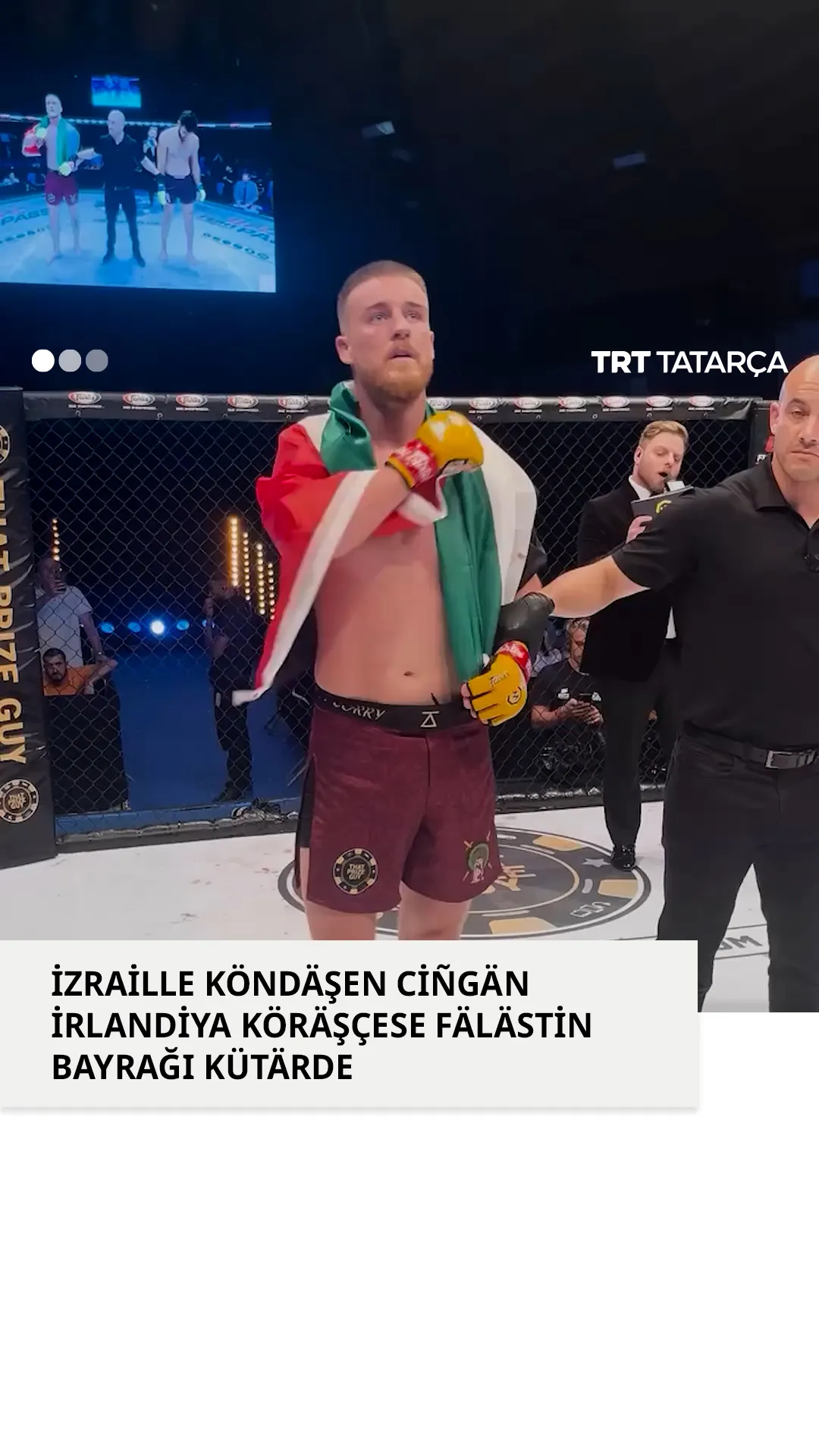 İzraille köndäşen ciñgän irlandiyäle köräşçe Fälästin bayrağın kütärde