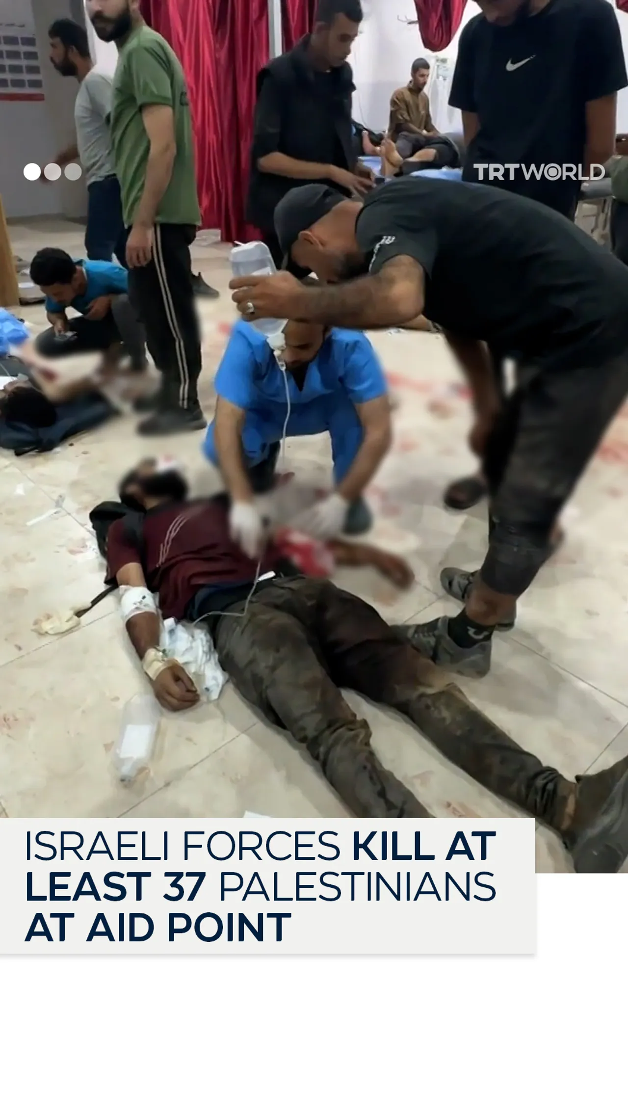 At least 37 Palestinians killed by Israeli forces at aid point in Gaza