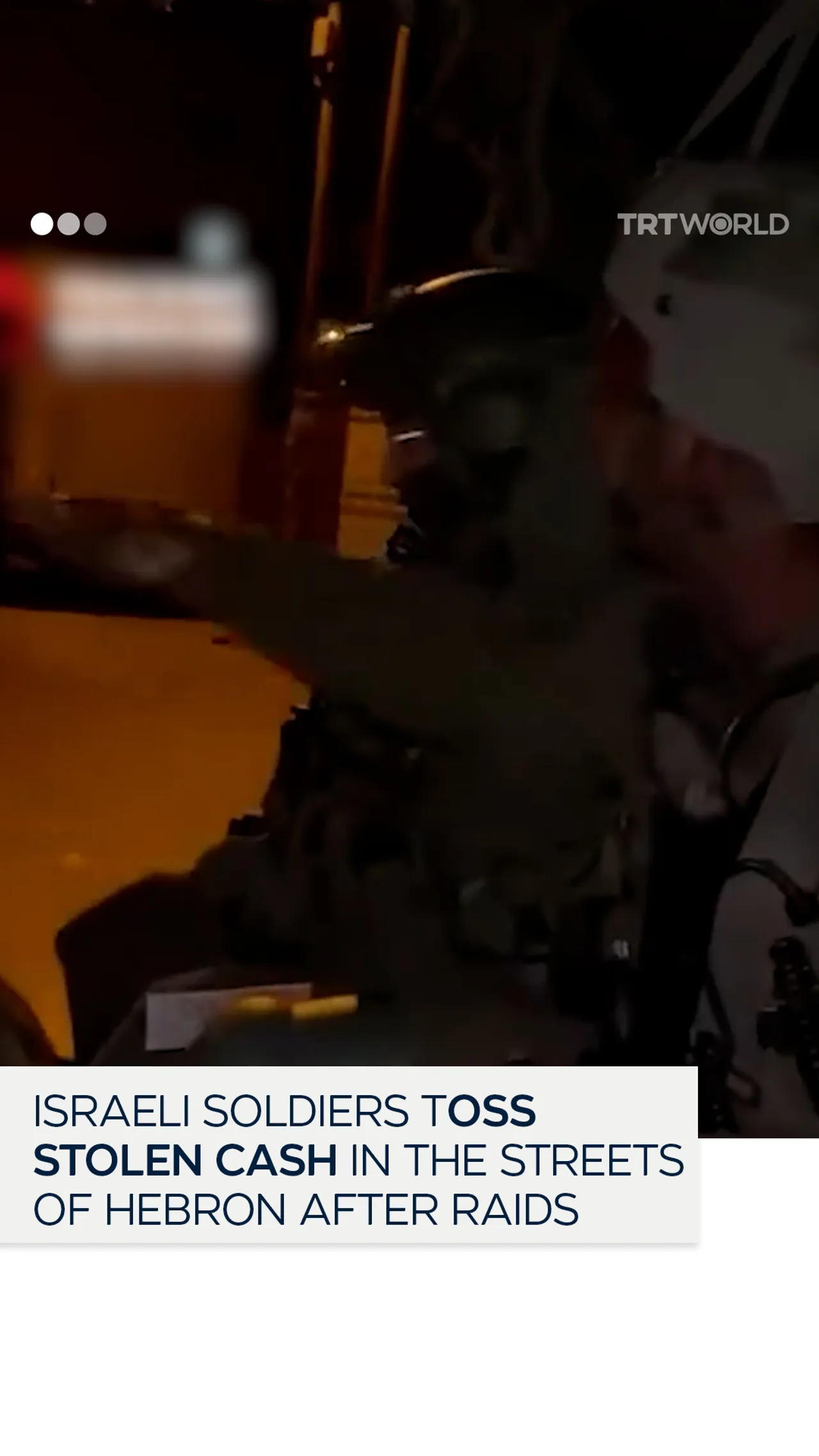 Israeli soldiers throw stolen cash in Hebron streets after raiding Palestinian homes