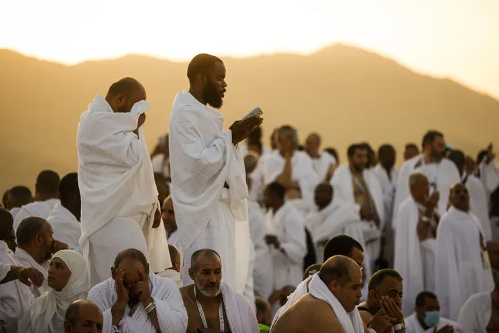 Muslim pilgrims pray at Mount Arafat during annual Hajj